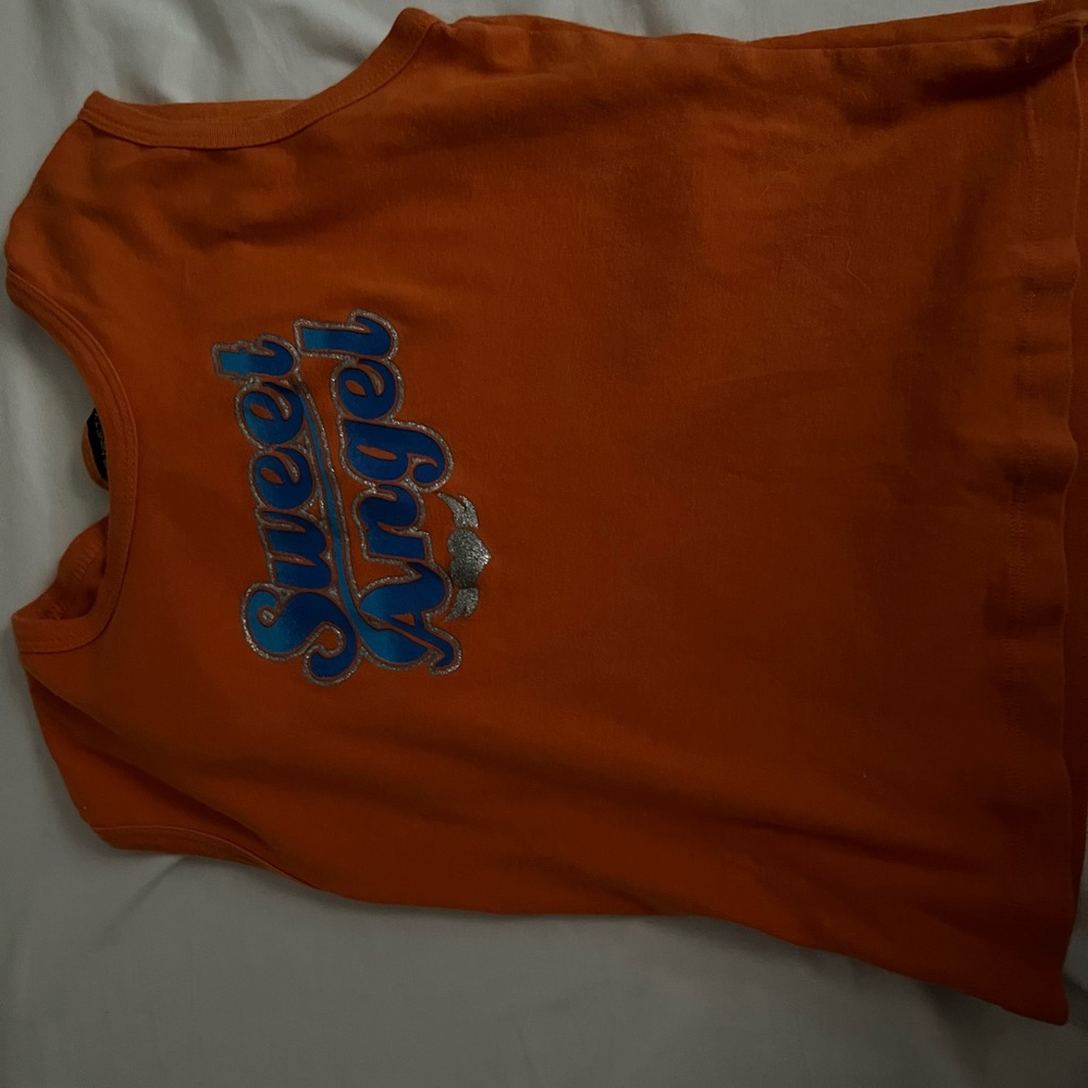 It’s a tank top it’s orange and soft